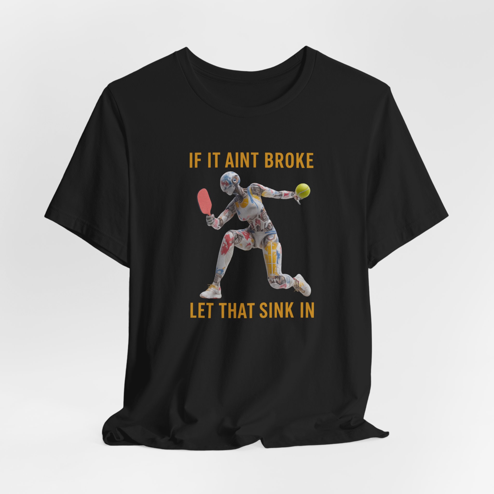 Short Sleeve Tee - Futuristic Female Robot Playing Pickleball 'If It Aint Broke, Let That Sink In'